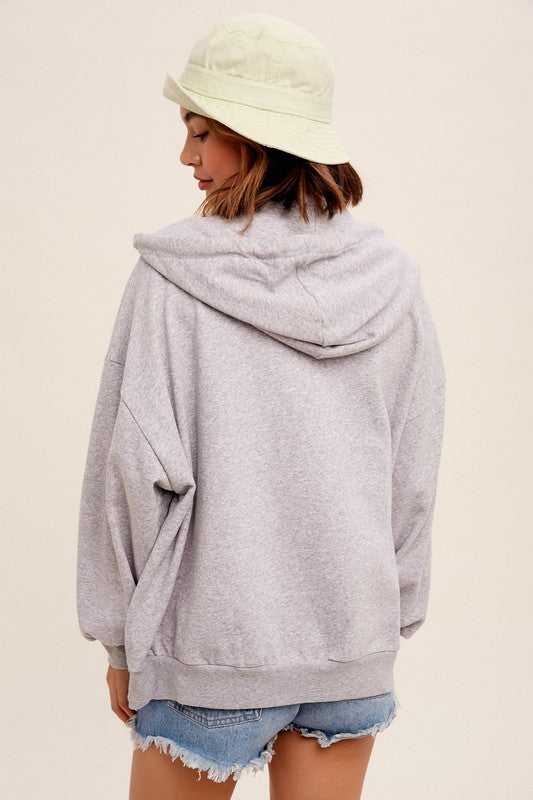 Taking Off Jacket in Heather Grey